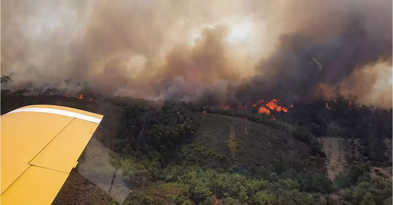 Greek PM warns of difficult days ahead as wildfires rage