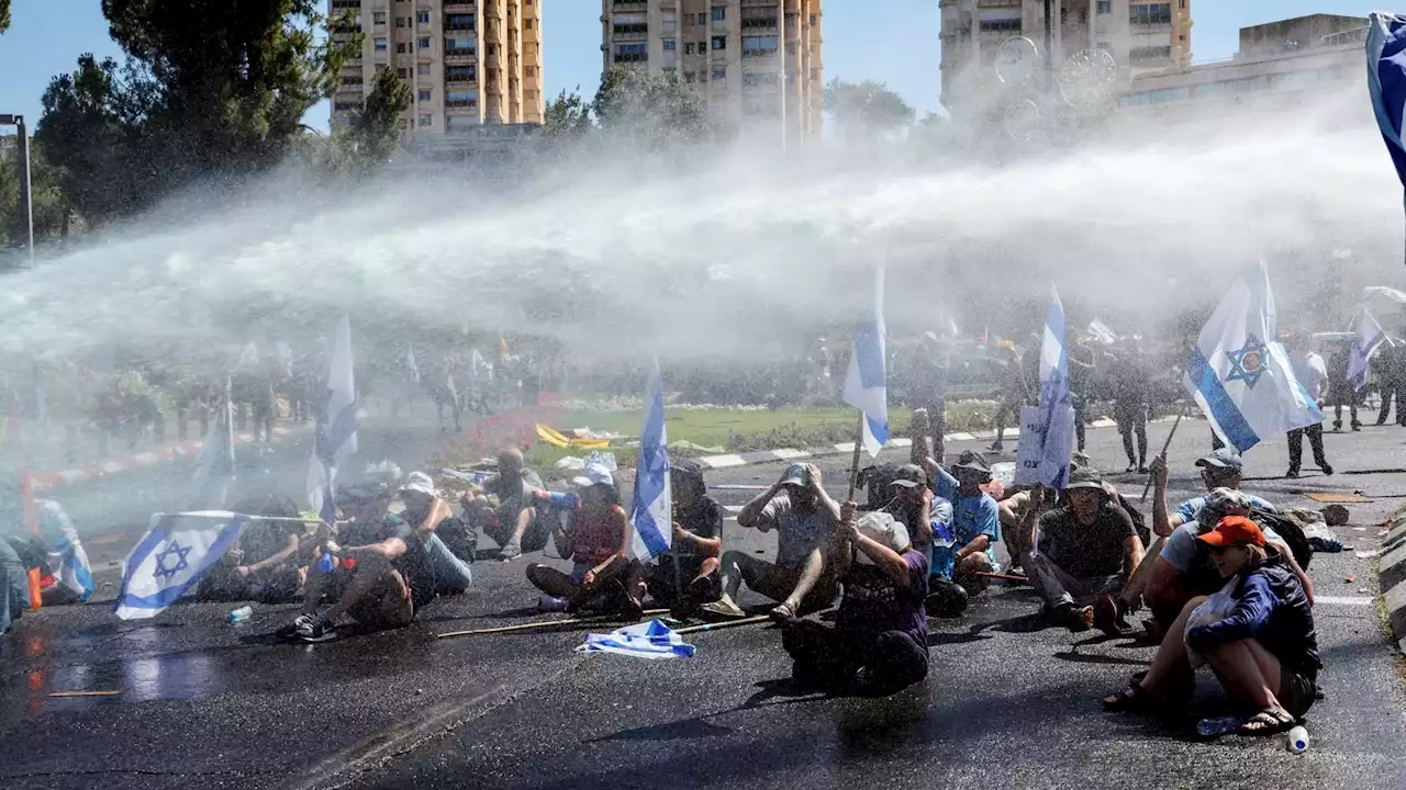 Protests in Israel as parliament approves key part of controversial changes to justice system