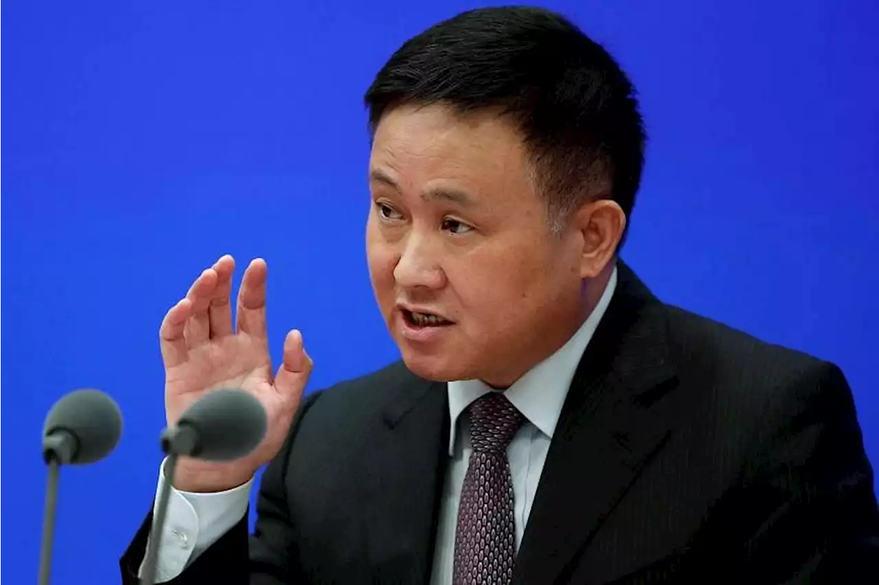 China appoints firefighting technocrat as new central bank governor