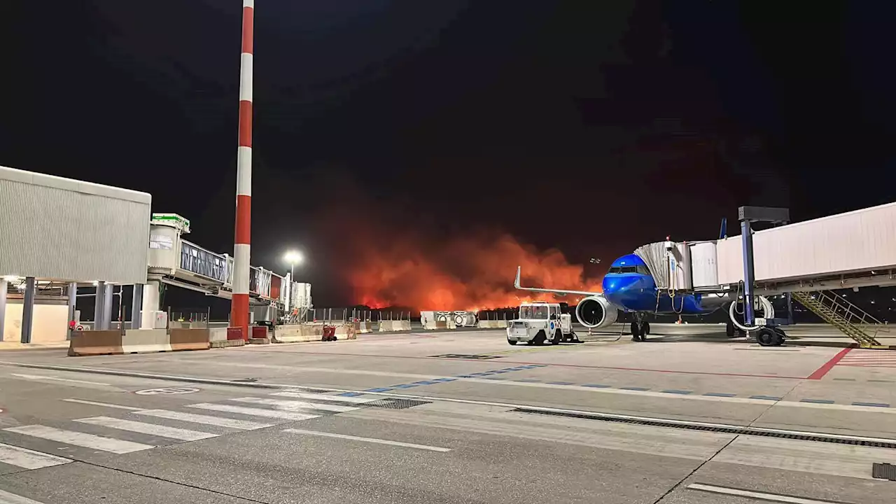 Italian airport reopens after closing for several hours because of wildfires