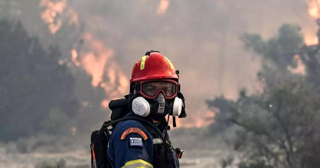 A firefighting plane crashes as new evacuations are ordered in Greece