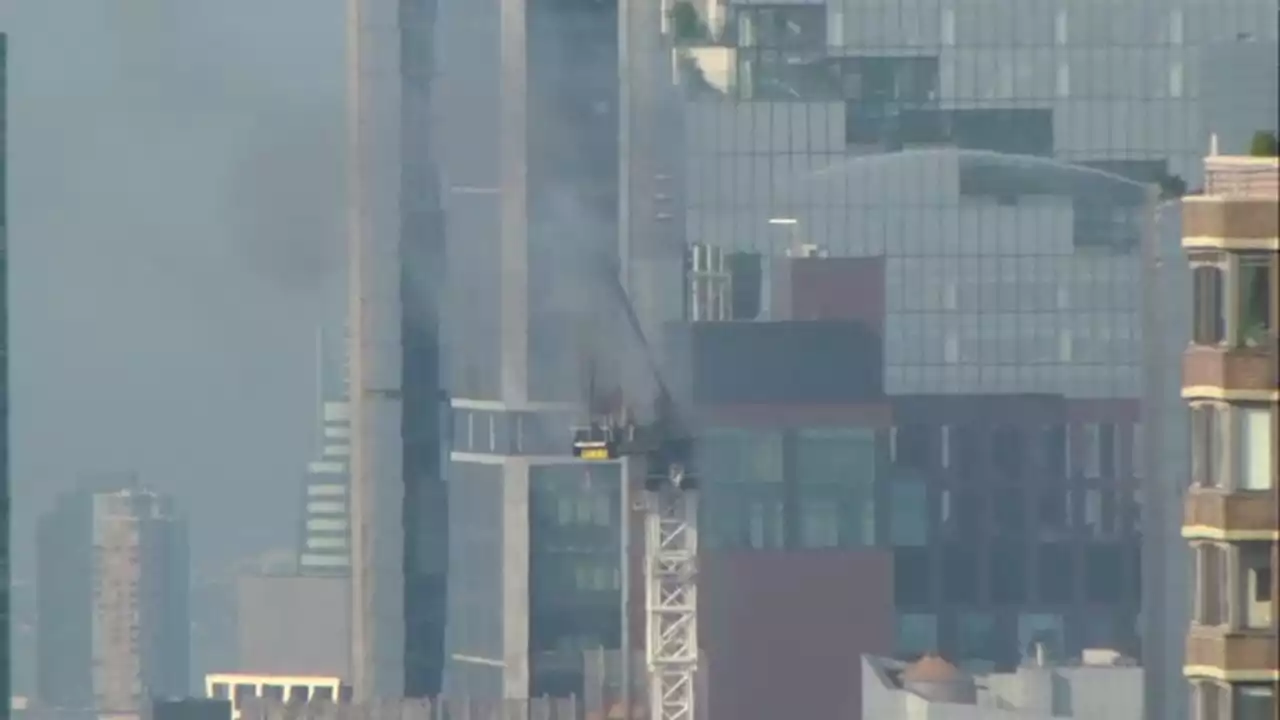 New York crane catches fire, partially collapses on Manhattan high rise