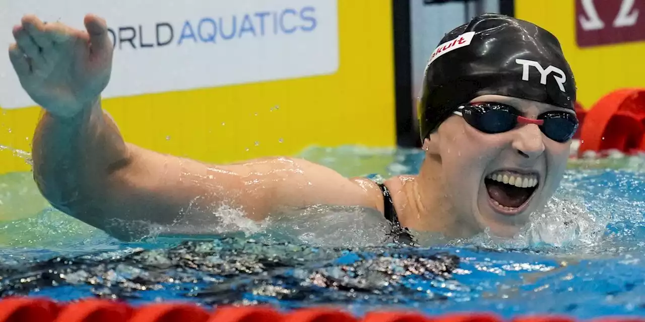 Katie Ledecky wins gold in 1,500 at the swimming worlds to tie mark set by Michael Phelps