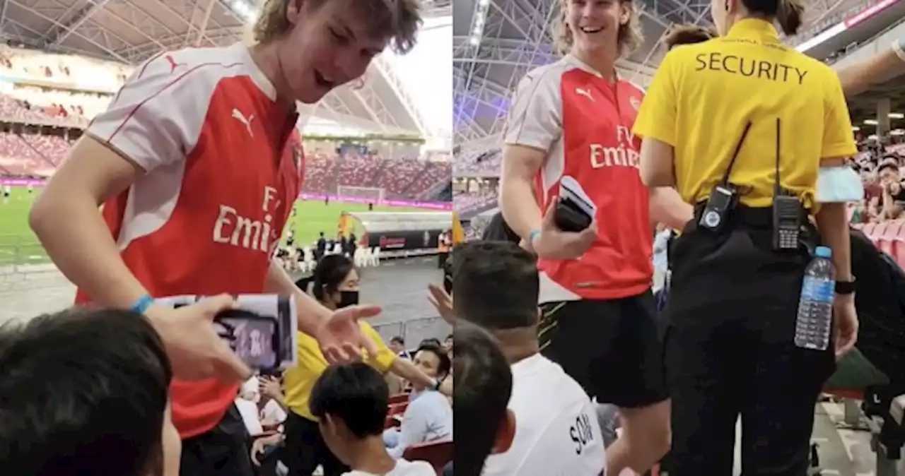 Troublemaker? Man dons Arsenal jersey, triggers fans at Spurs training session in National Stadium