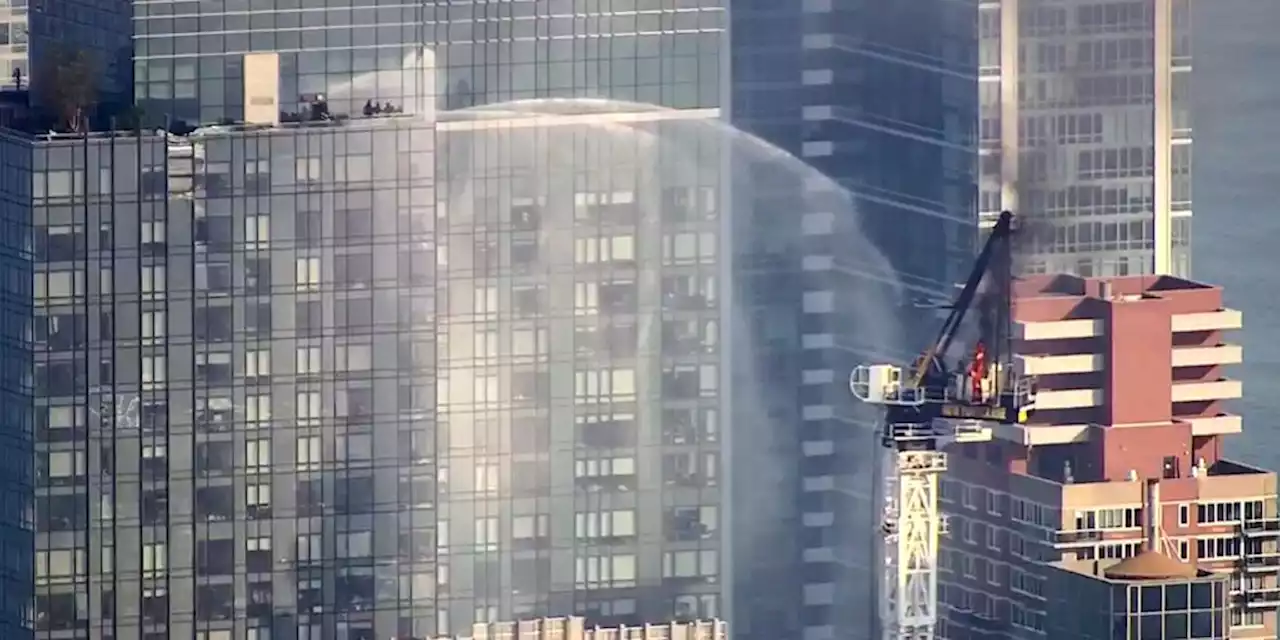 WATCH LIVE: Crane crashes on high-rise building igniting flames as thick black smoke fills the air | Fox Business Video