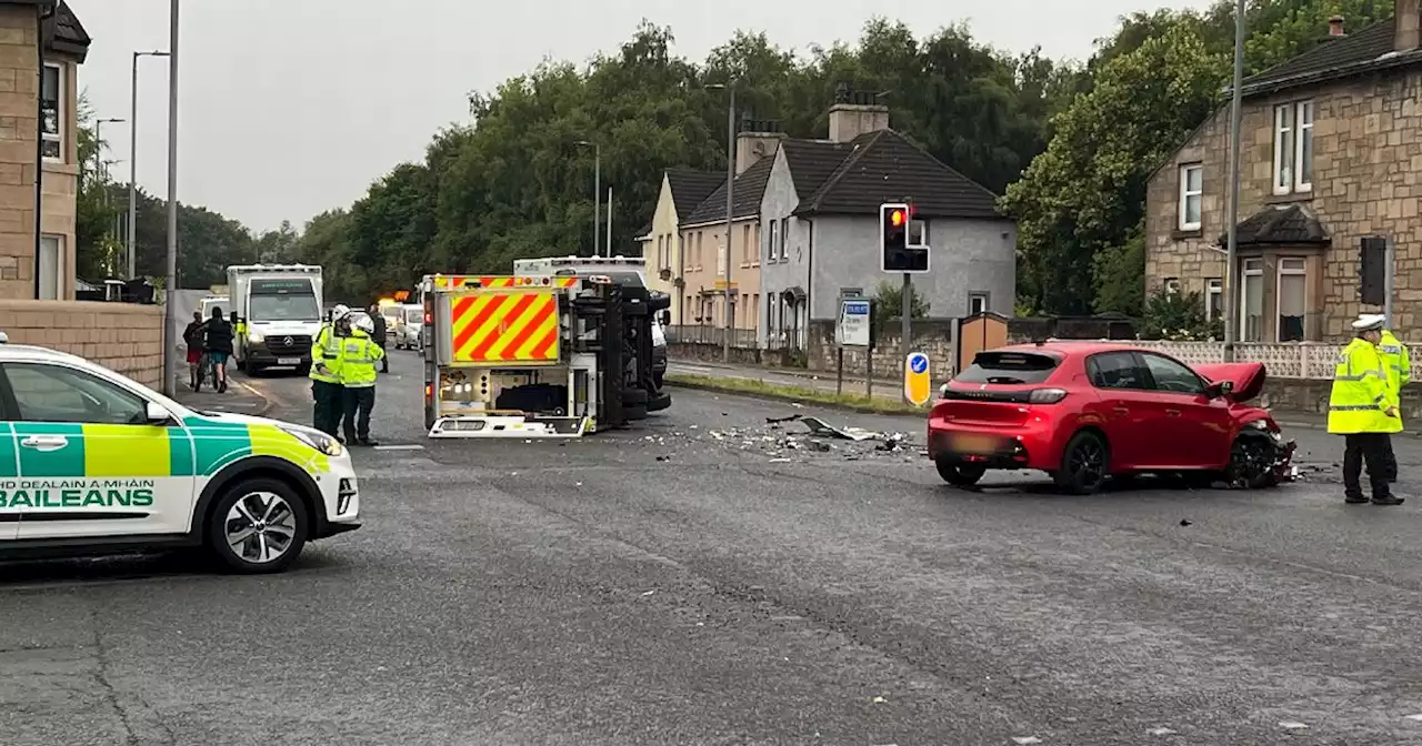 Crash on Glasgow road between ambulance and car as police rush to incident