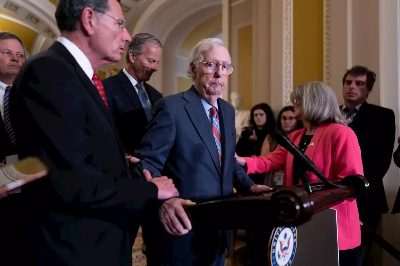 Senate GOP leader Mitch McConnell leaves news conference after freezing up mid-sentence