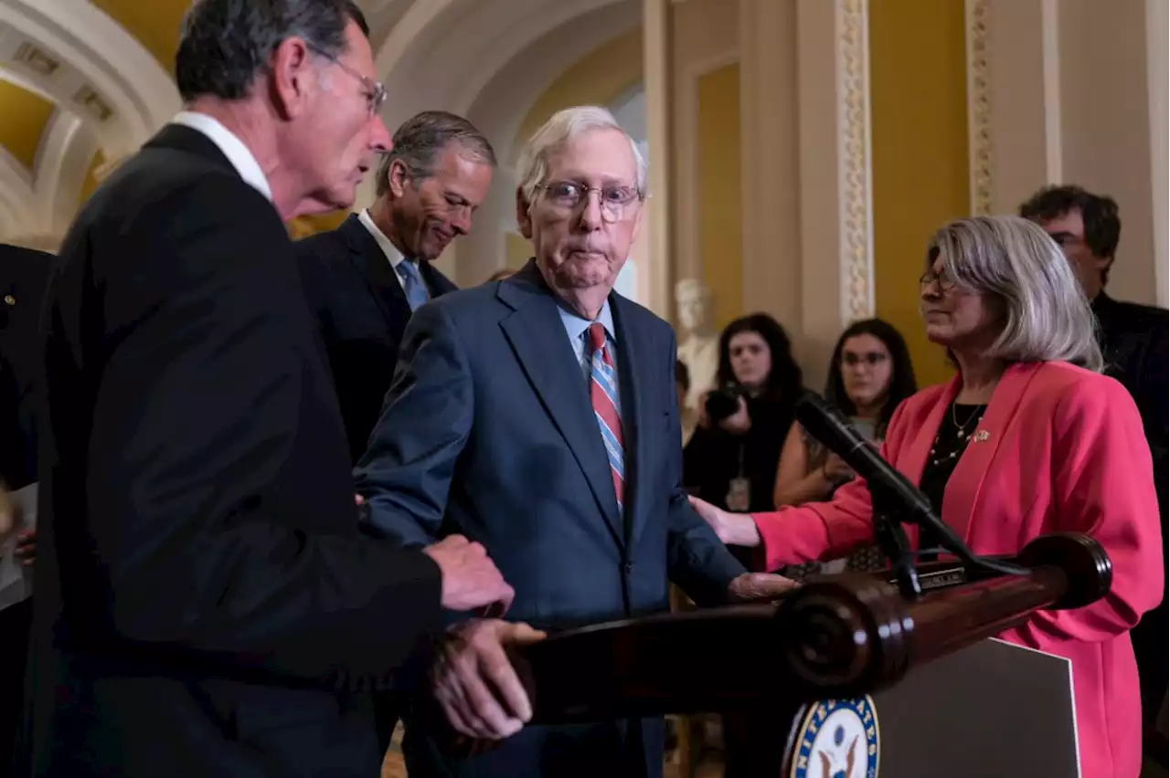 Senate GOP leader Mitch McConnell briefly leaves news conference after freezing up mid-sentence