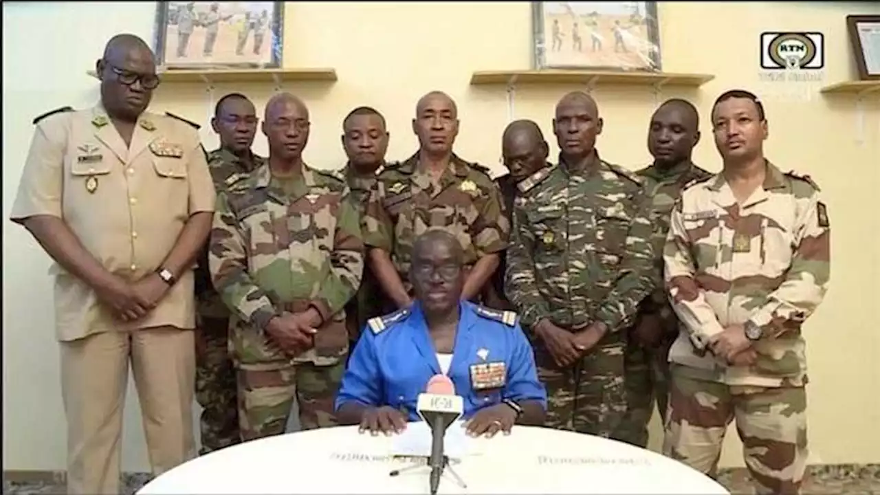 Niger coup supporters set fire to ruling party HQ, police fire teargas