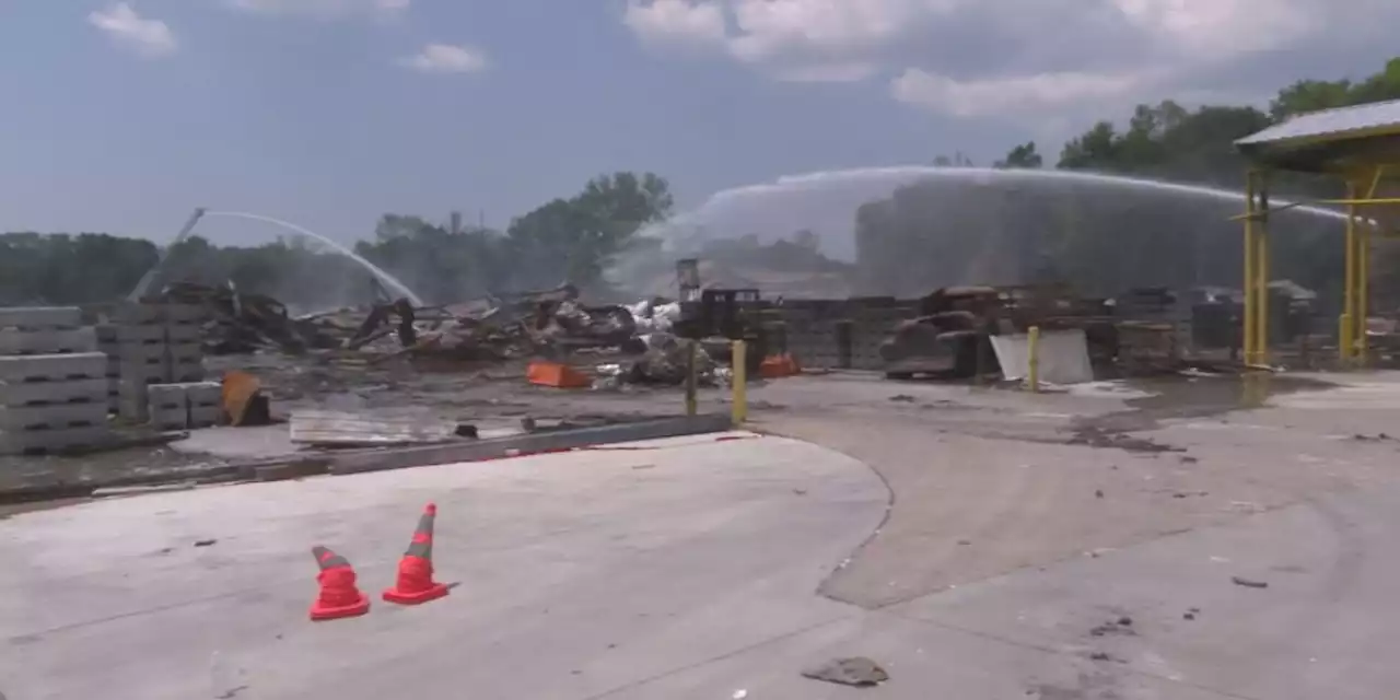 Firefighters continue to monitor warehouse fire one week later