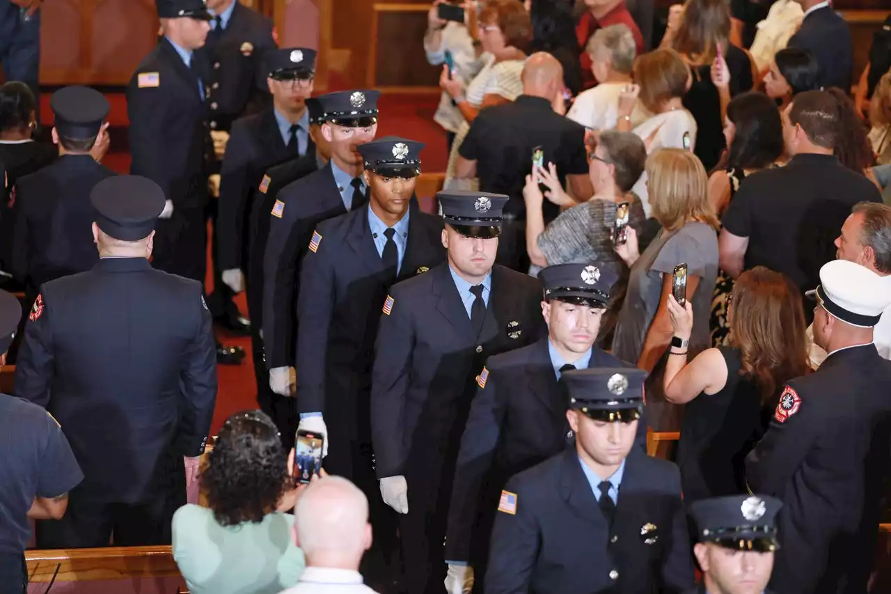 After losing 2 firefighters in port fire, Newark swears in 9 rookies