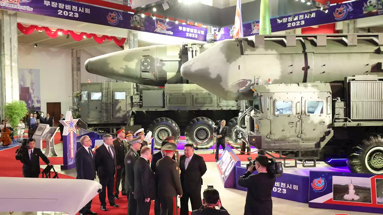 Kim Jong Un shows off banned ballistic missiles to Russia's defence minister