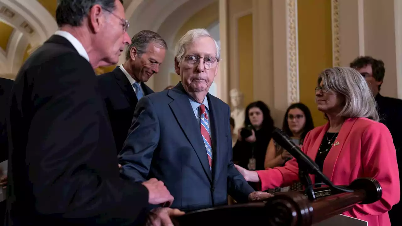 Mitch McConnell escorted away from press conference after falling silent