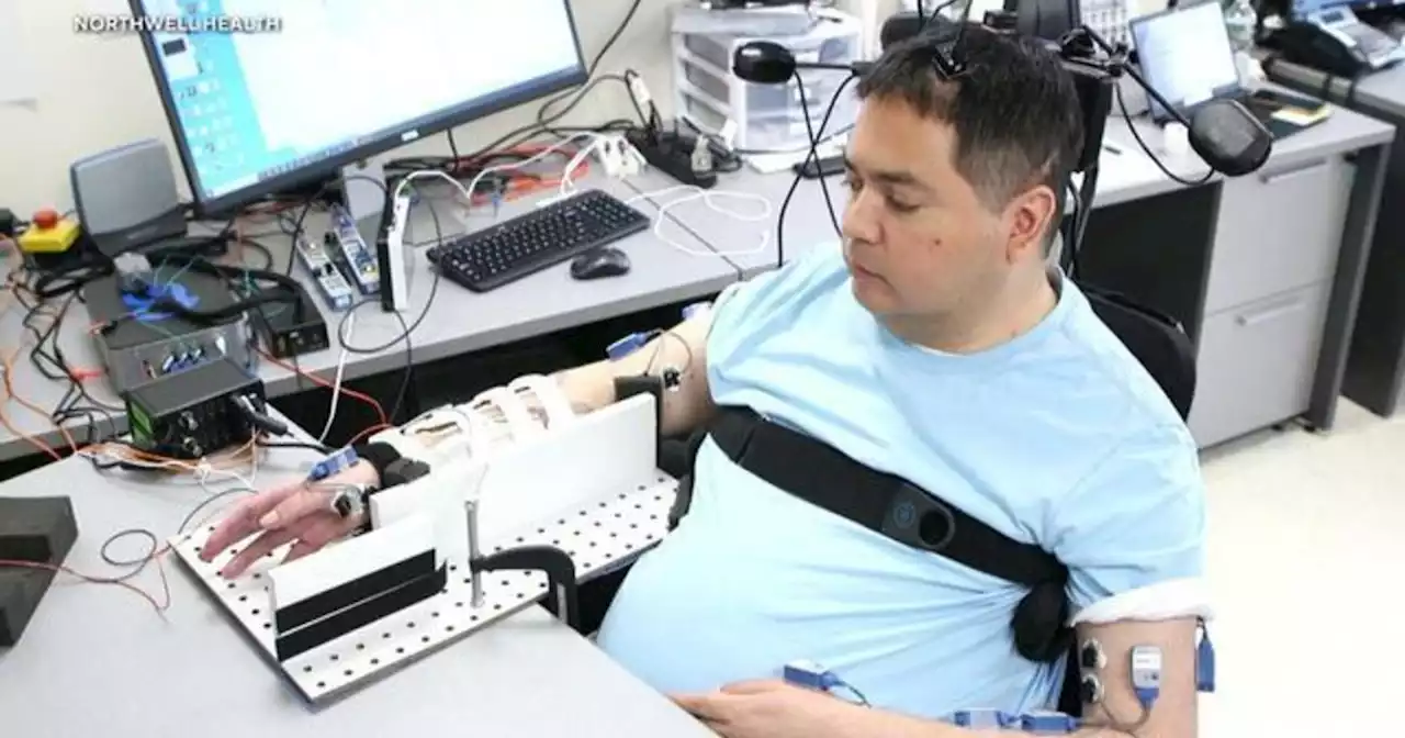 Groundbreaking brain implants restore hand control — and hope — for paralyzed man