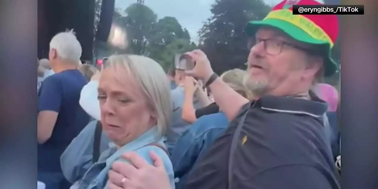 WATCH: Man caresses woman mistaken for his wife at concert in viral video