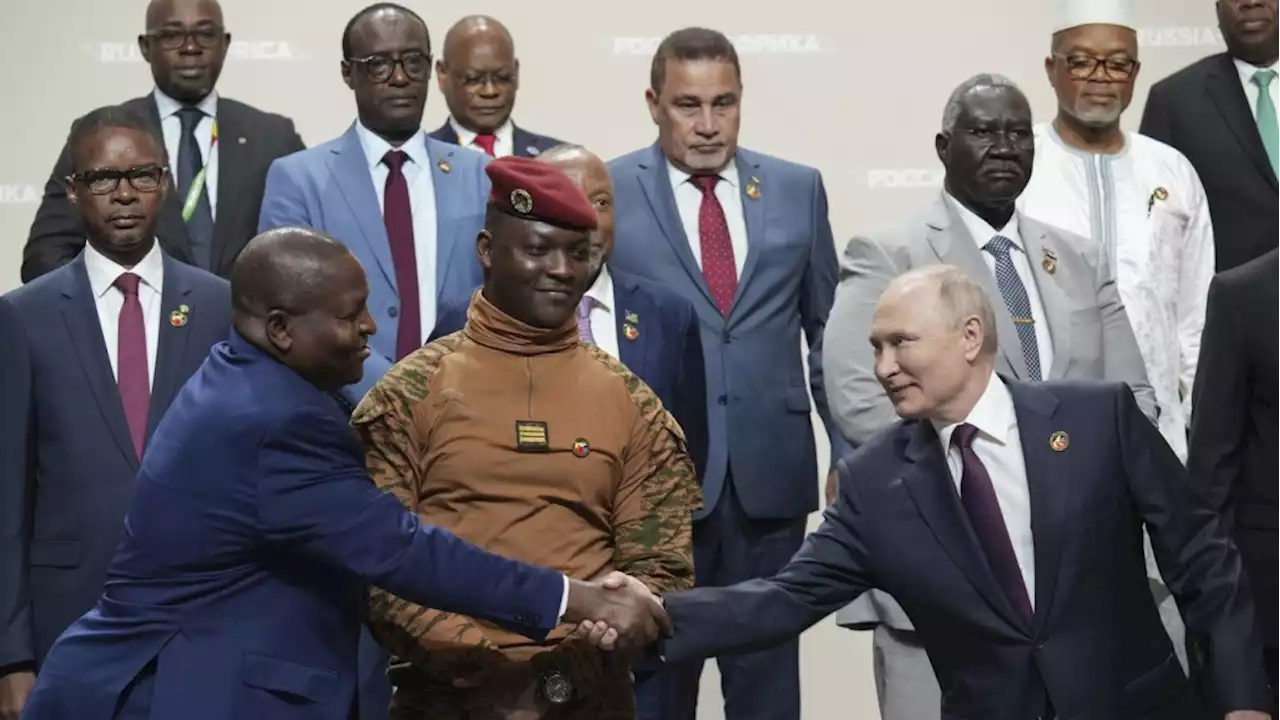 Putin woos African leaders at a summit in Russia with promises of expanding trade and other ties