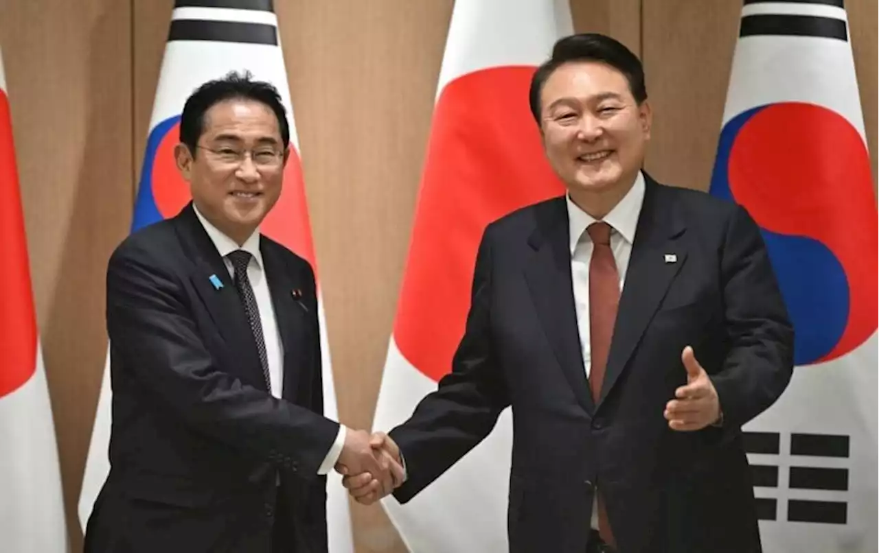 Japan welcomes thaw with S. Korea in annual defence paper