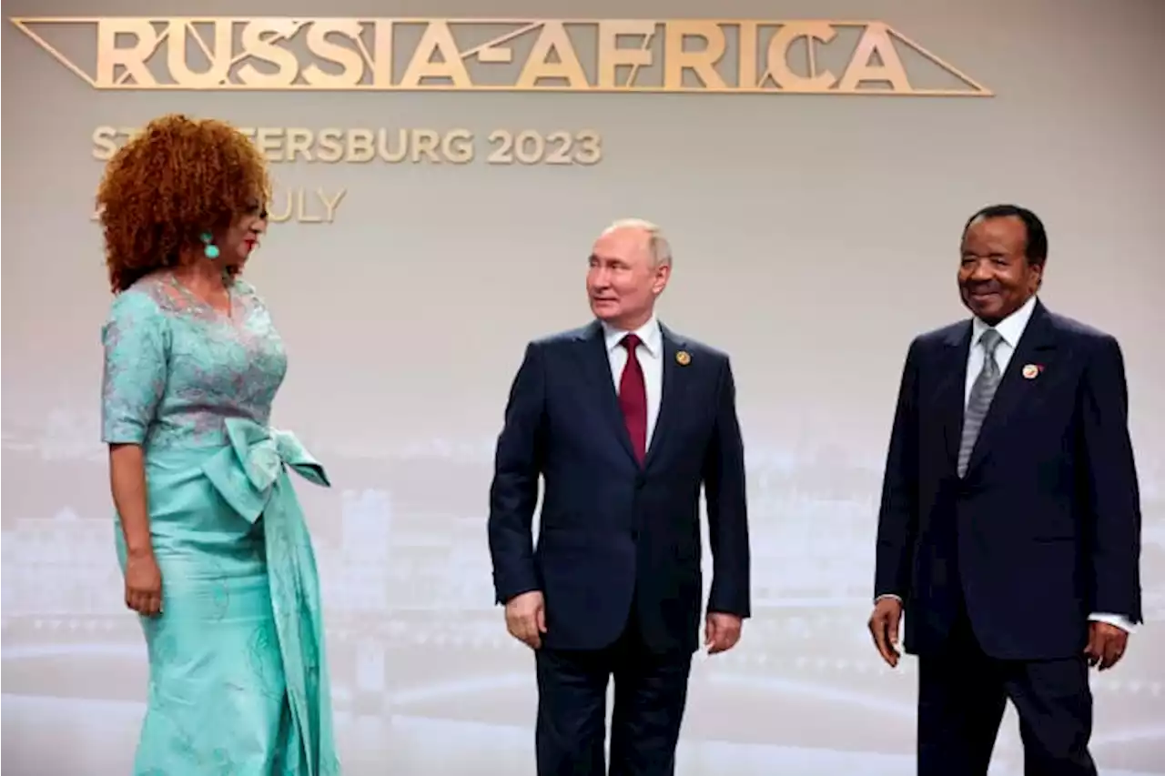 Putin woos African leaders at a summit in Russia with promises of expanding trade and other ties