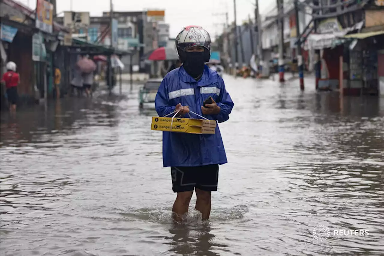 Typhoon Doksuri destroys power lines, closes factories as it rips into China