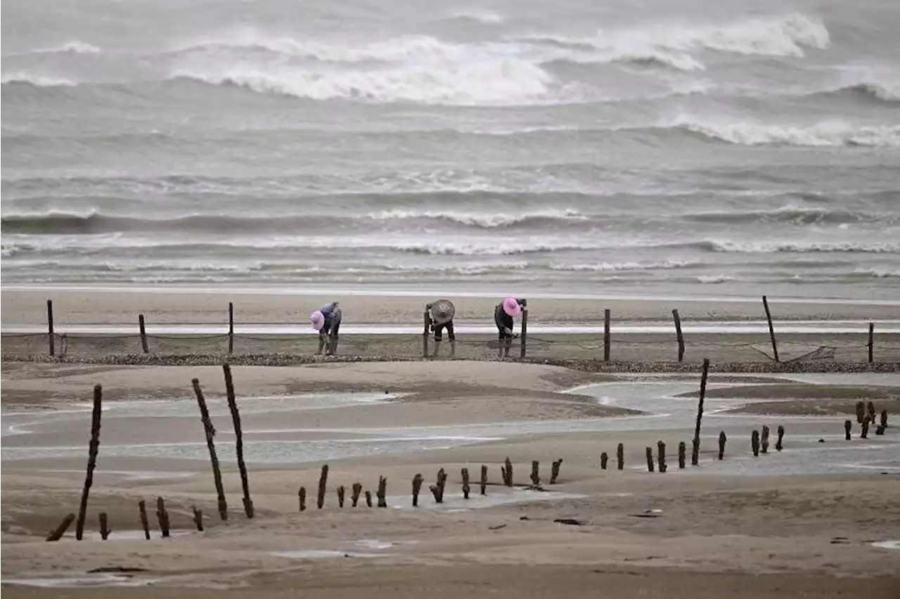 China shuts schools, halts flights as super typhoon approaches