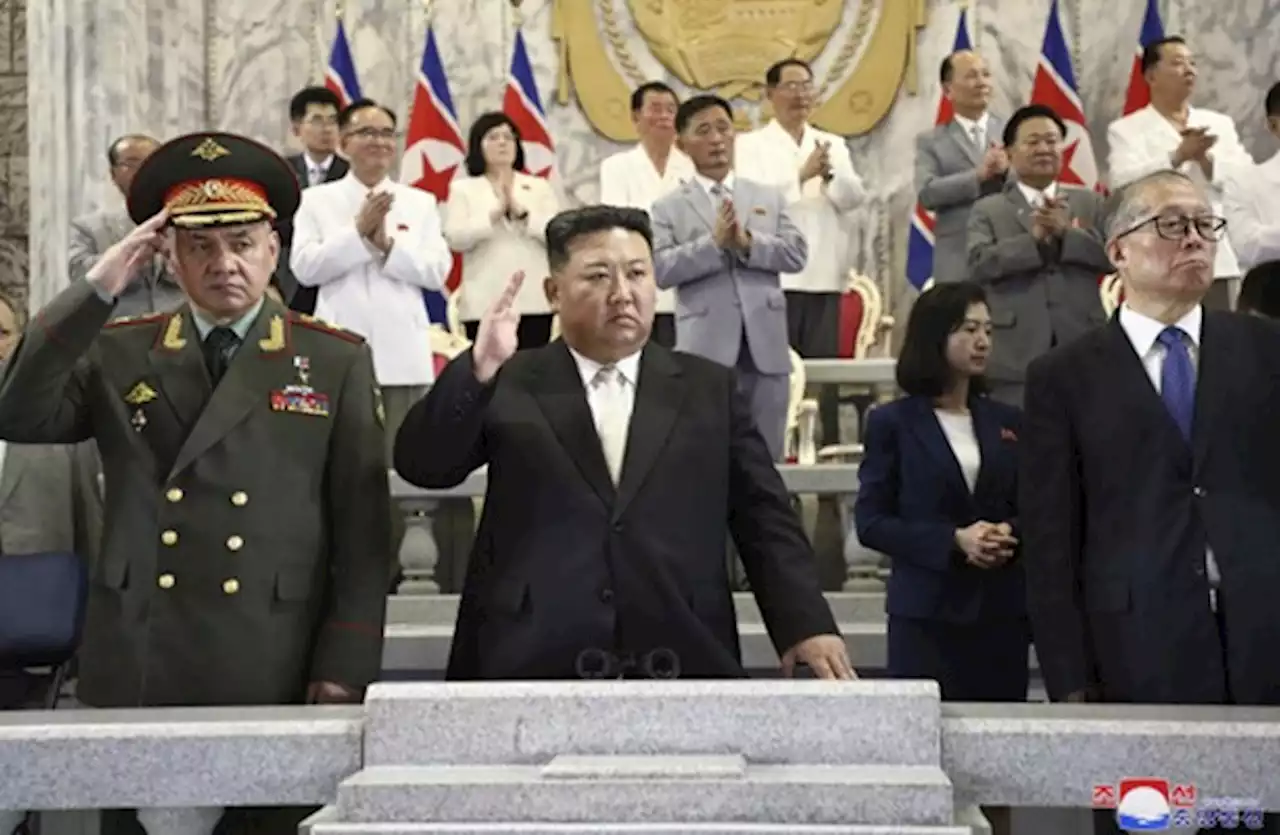 Russian and Chinese officials join Kim Jong Un at a North Korean military parade