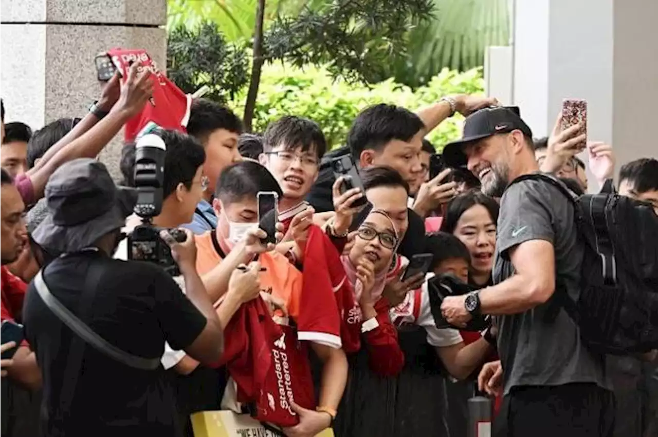 Jurgen Klopp charms Singapore fans as Liverpool arrive for two friendlies