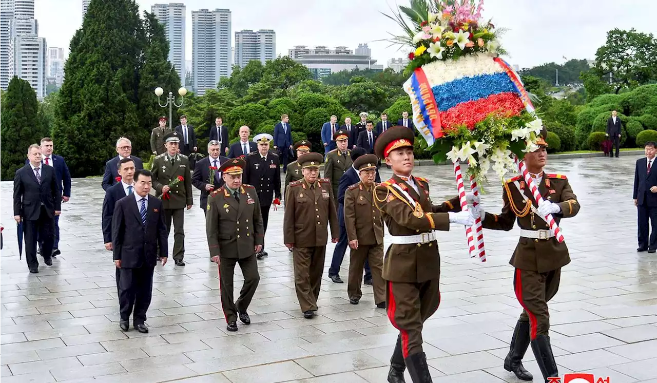 Kim Jong-un shares center stage with Russian, Chinese delegates at military parade