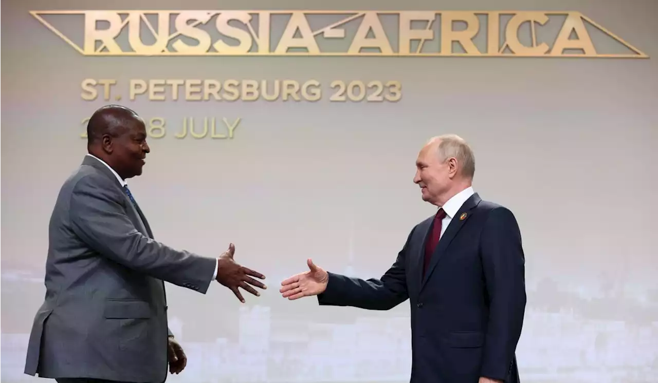 Putin woos African leaders at a summit in Russia with promises of expanding trade and other ties