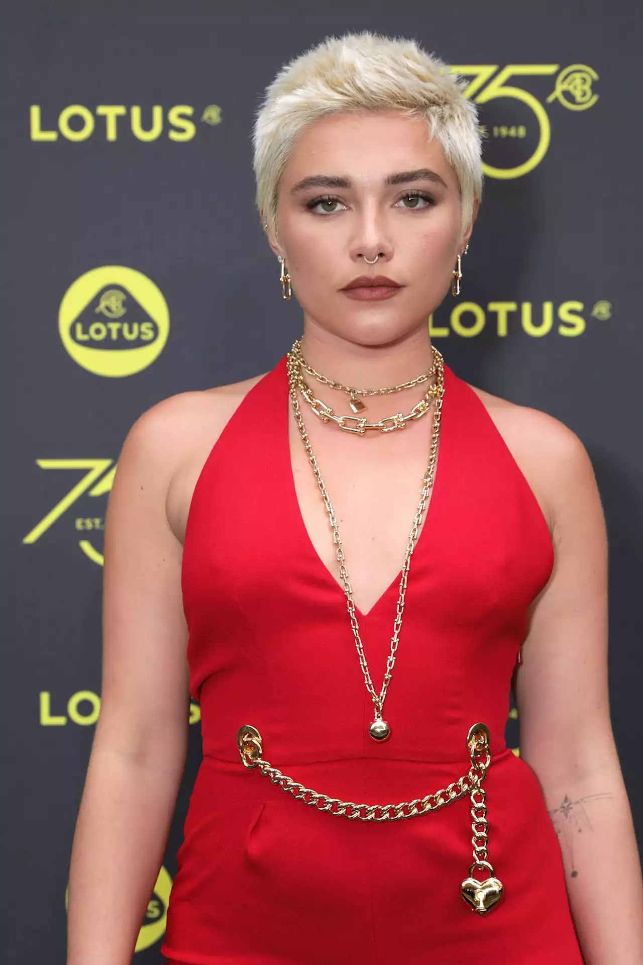 Florence Pugh Shows Off Icy New Hair In a Plunging Fiery Jumpsuit