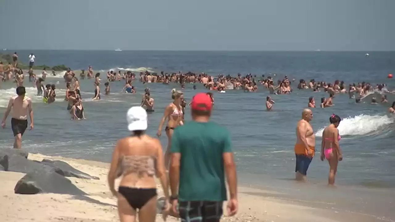 Beachgoers flock to the shore to beat the extreme heat across the Tri-State