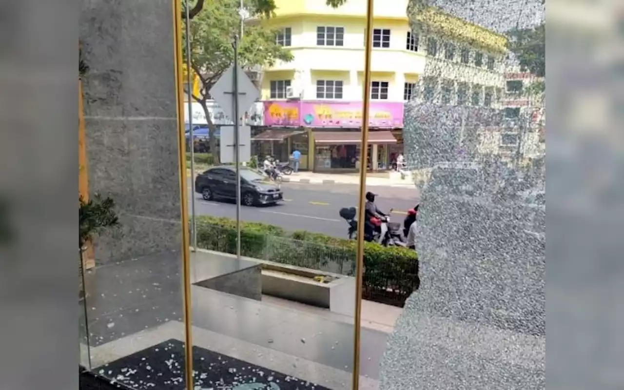 Cops after m-cyclist who threw stones and broke glass wall at PAS HQ