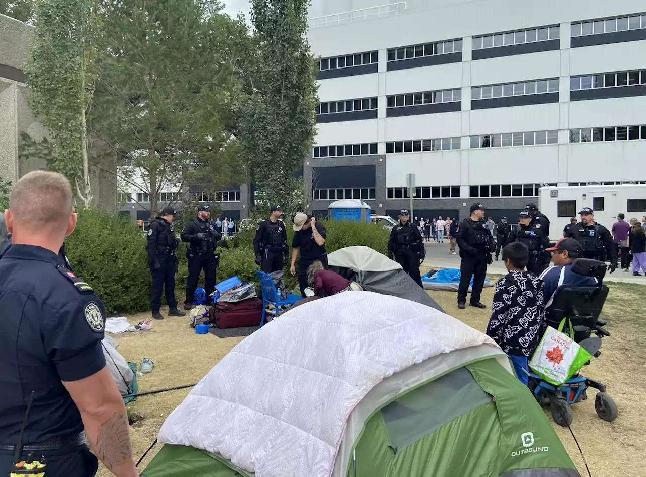 People taken into custody as police dismantle encampment in front of Regina City Hall