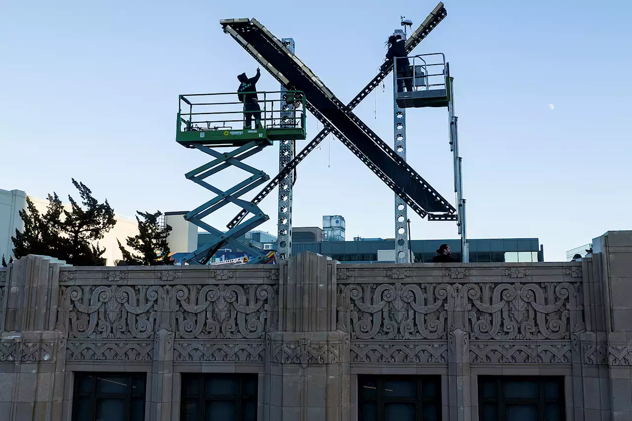 Musk’s ‘X’ logo atop former Twitter headquarters draws city scrutiny