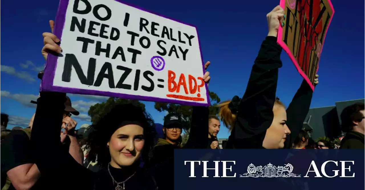 Anti-fascist protesters rally outside neo-Nazi weightlifting event