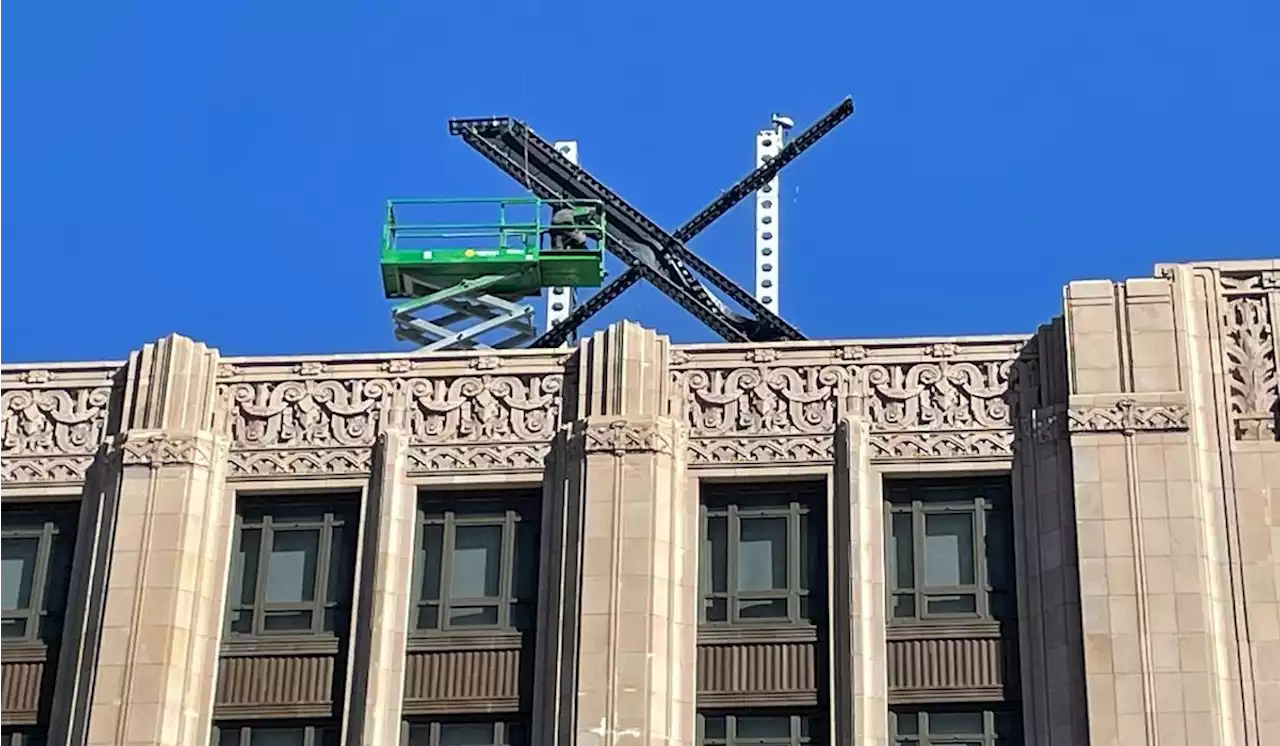 ‘X’ logo installed atop Twitter building, spurring San Francisco investigation