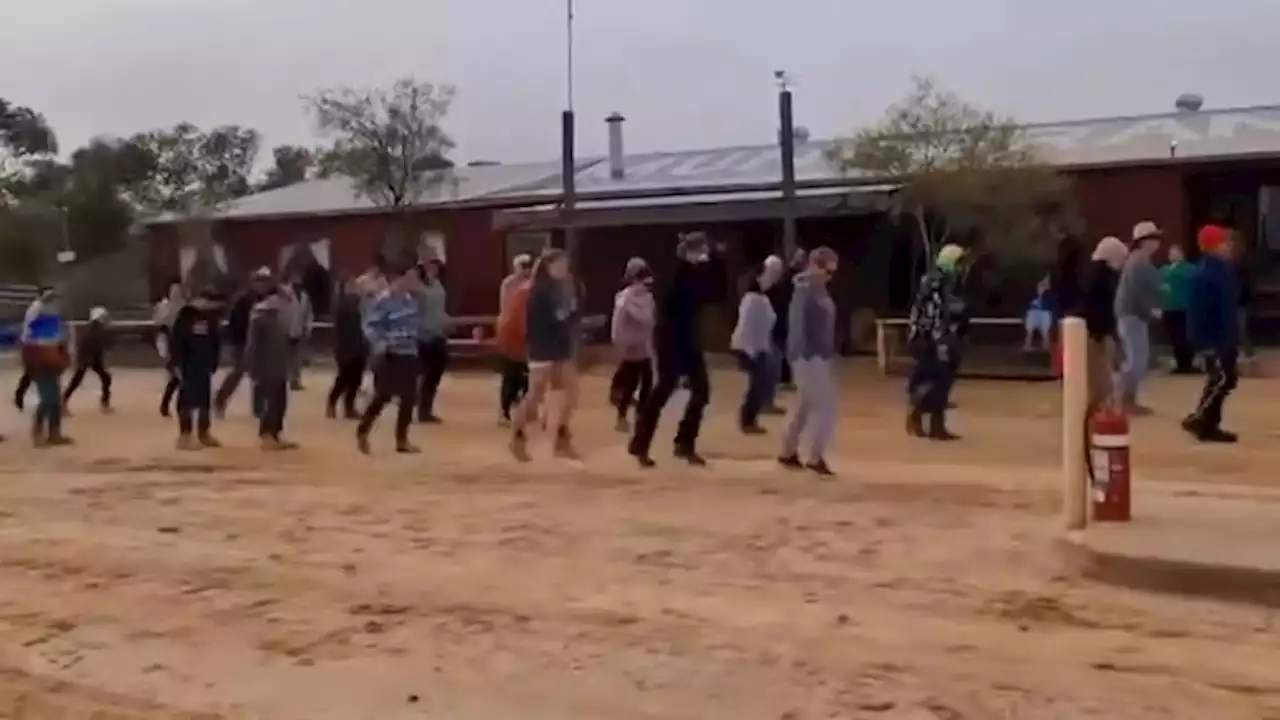 Stranded Big Red Bash punters do the Nutbush in Mungerannie, granted exemption to travel Birdsville Track