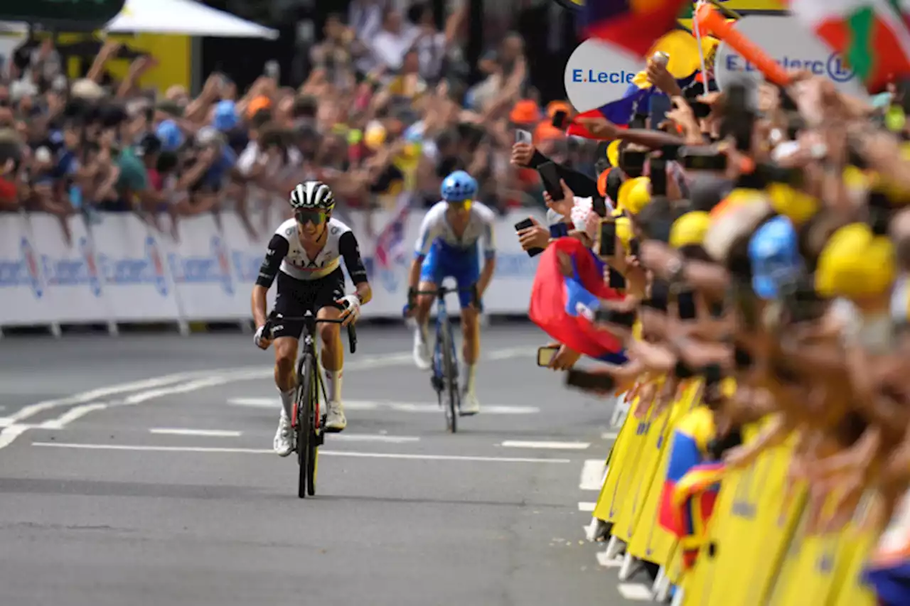 Adam Yates beats twin brother Simon Yates to win first stage of Tour de France | The Associated Press