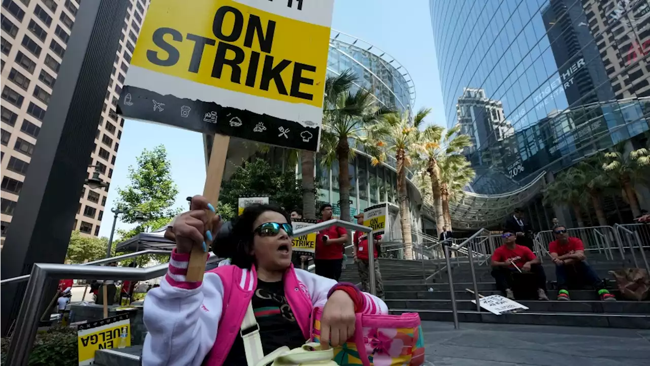 Workers strike at major Southern California hotels over pay and benefits