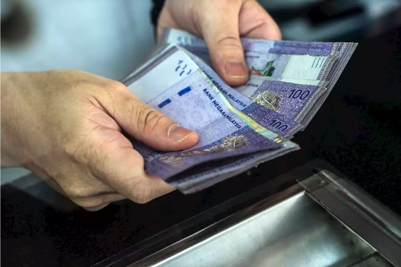 Ringgit opens slighly higher against US dollar