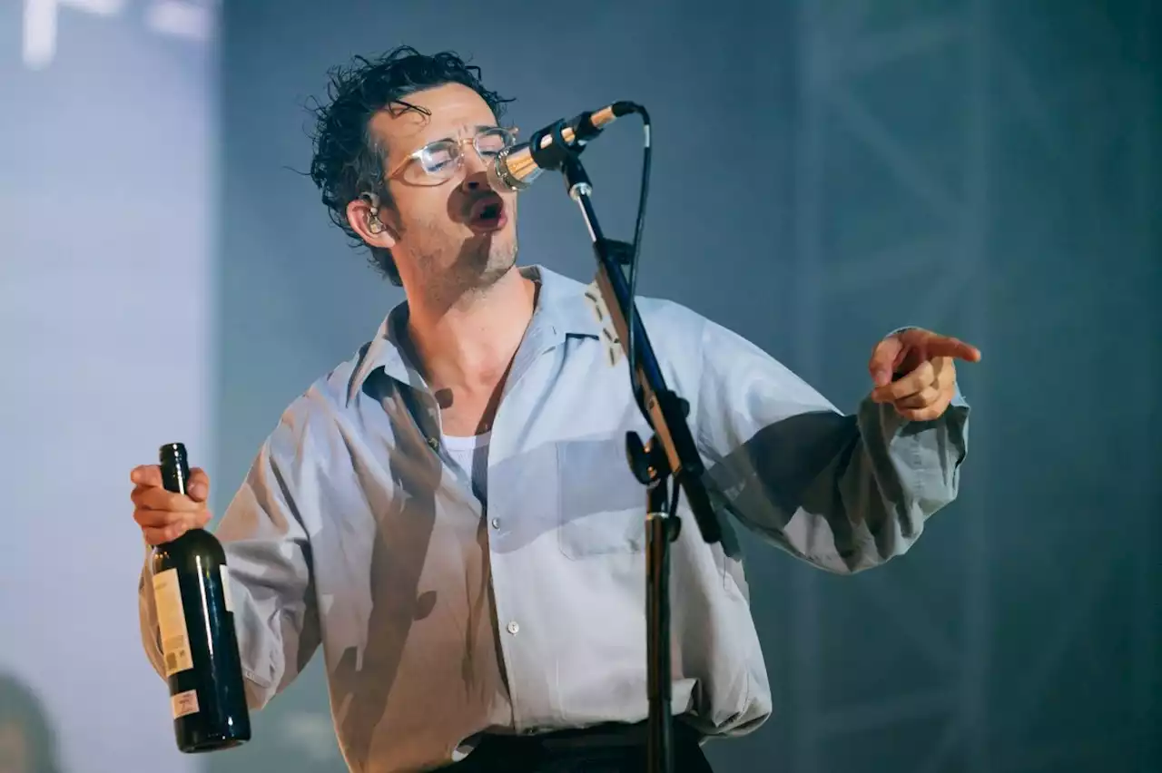 At The 1975's Finsbury Park show, Matty Healy chugs wine, eats raw steak and delivers