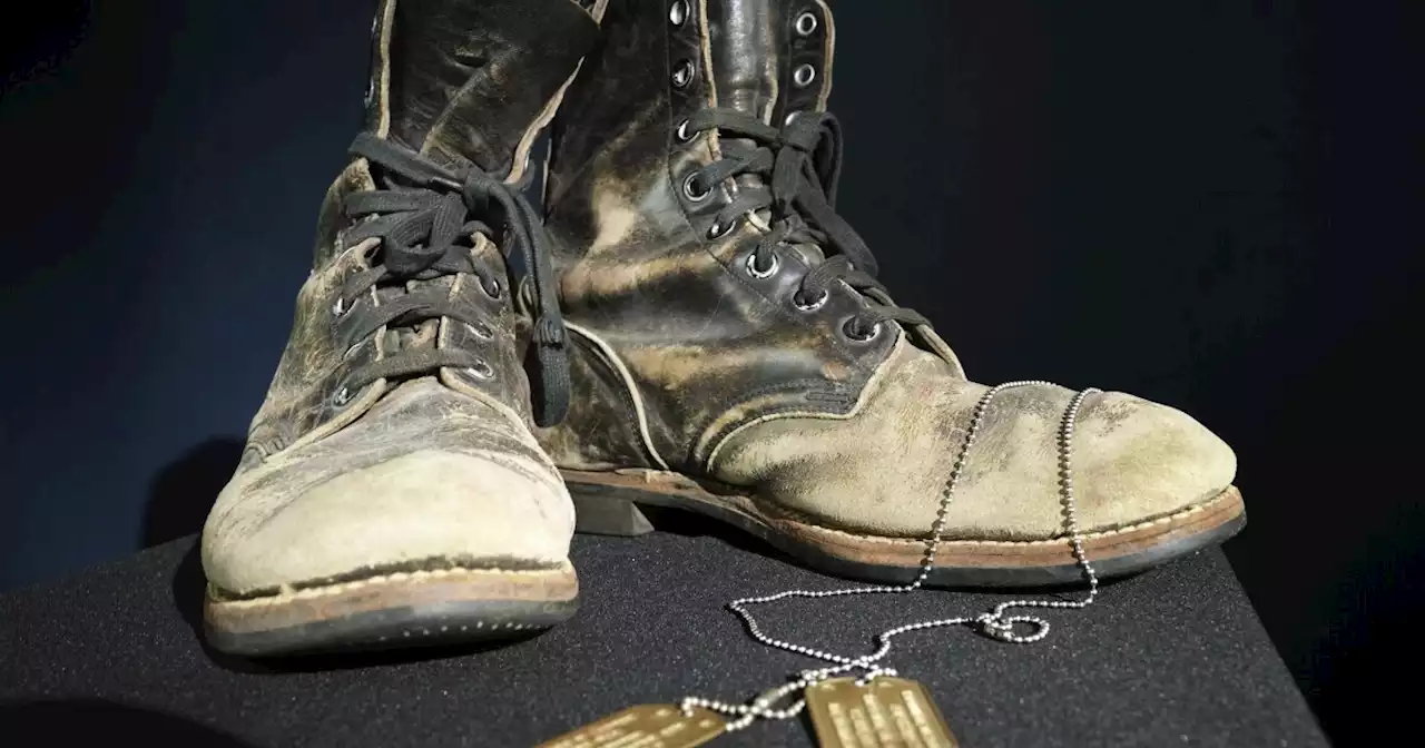 Boots and dog tags Alan Alda wore on ‘M-A-S-H’ sell at auction for $125,000 that will go to charity