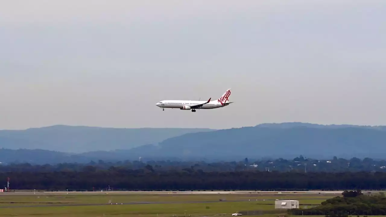 Three Brisbane men kicked off flight for allegedly vaping, drinking duty-free alcohol on board