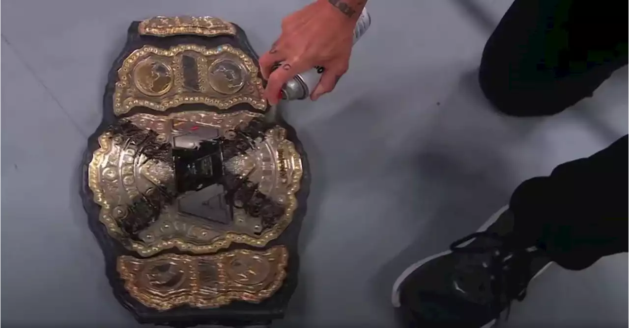 CM Punk Declares Himself Champ, Spraypaints Twitter Logo on Belt