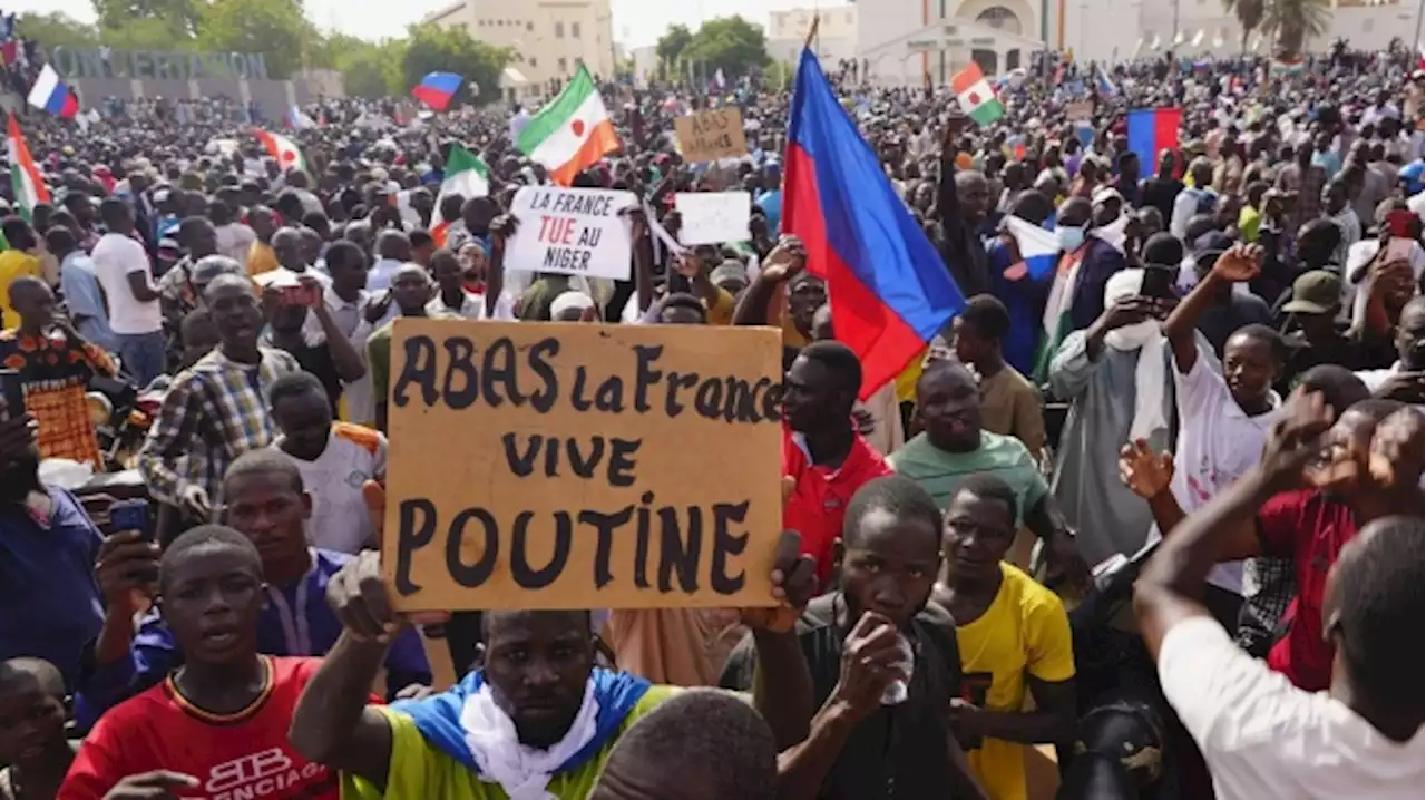 The French embassy in Niger is attacked as protesters waving Russian flags march through the capital