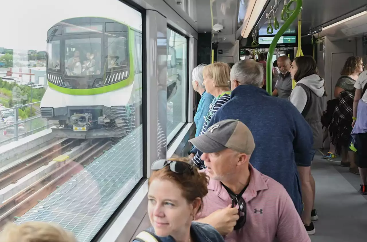 Excitement, optimism as hundreds line up to ride Montreal’s new light-rail train