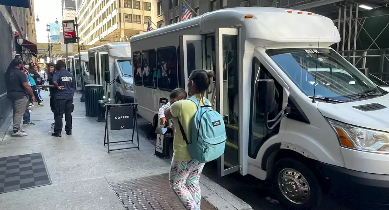 Migrants in NYC sleep in buses on street as intake center runs out of space