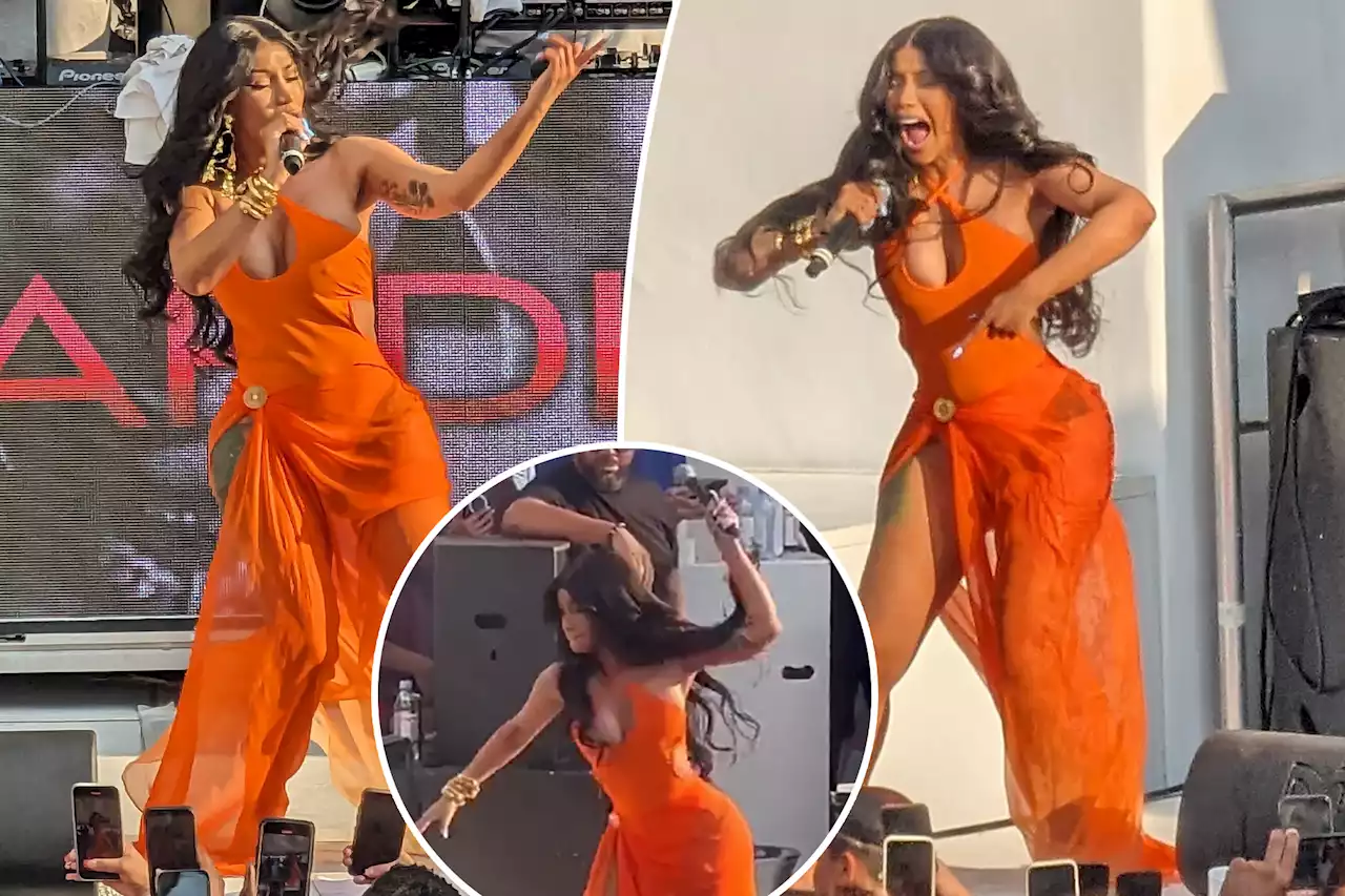 Cardi B chucks microphone at concertgoer who threw drink on her while performing in Vegas