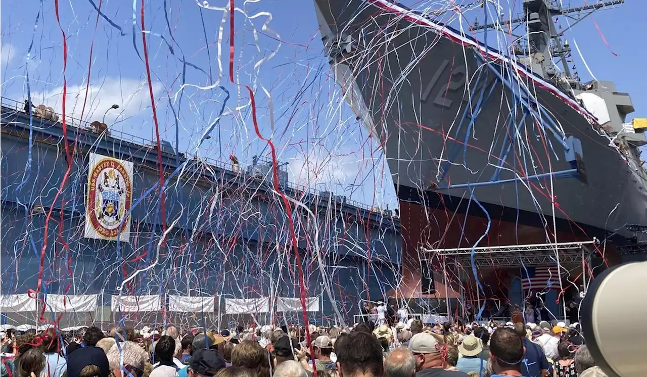 Medal of Honor recipient watches as warship bearing his name is christened in Maine