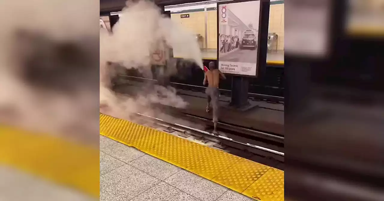 Shirtless man walks on TTC subway tracks spraying fire extinguisher in wild video