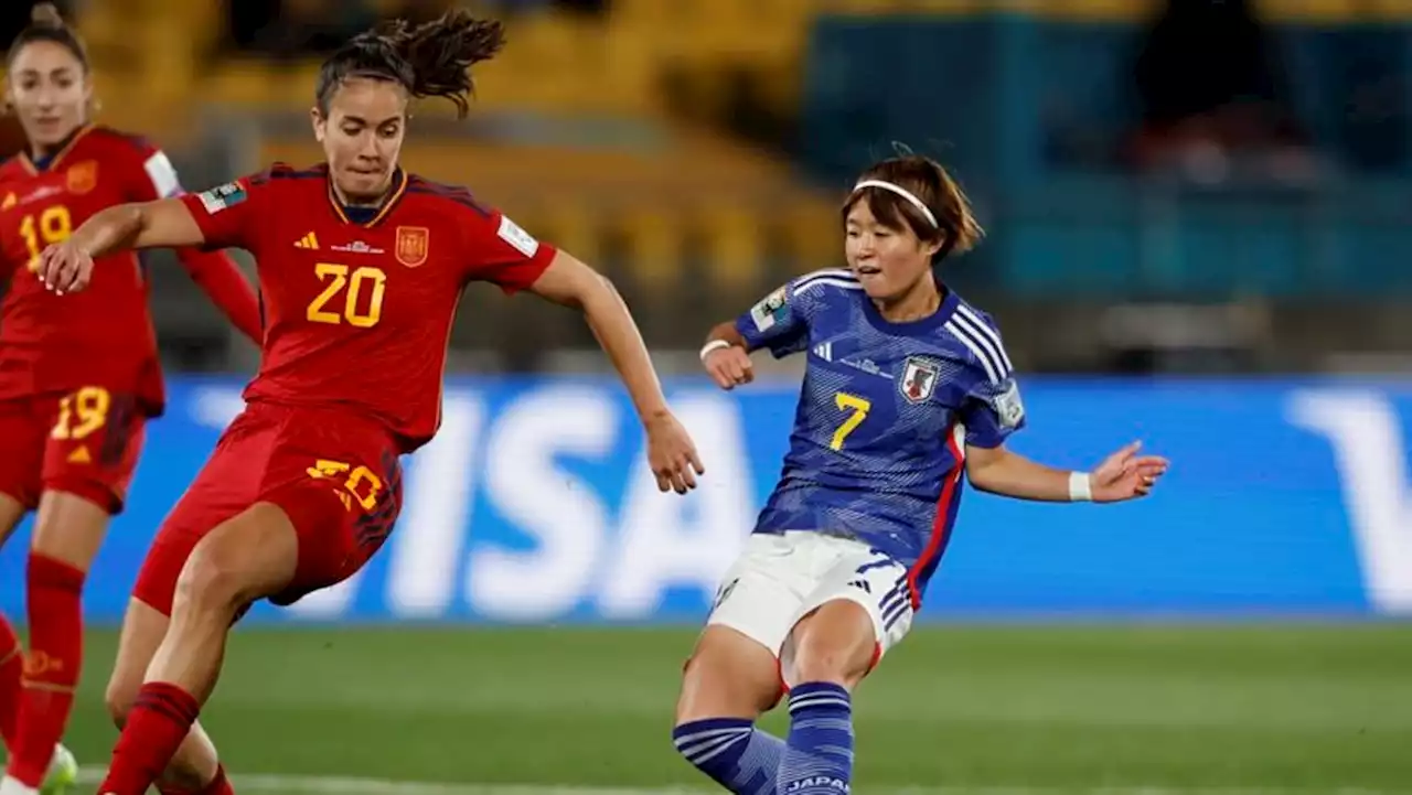 Japan hammer Spain on the break to top Group C